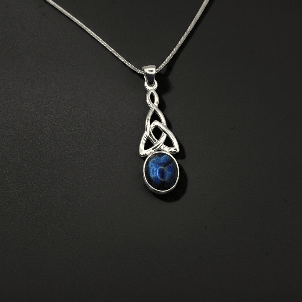 Celtic twist, Sterling Silver 925 drop pendant, featuring bright blue paua shell. - Stellify Jewellery