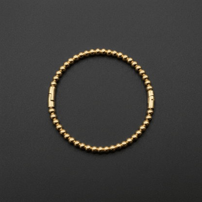 Gold, solid ball design, bangle with jump clasp. - Stellify Jewellery