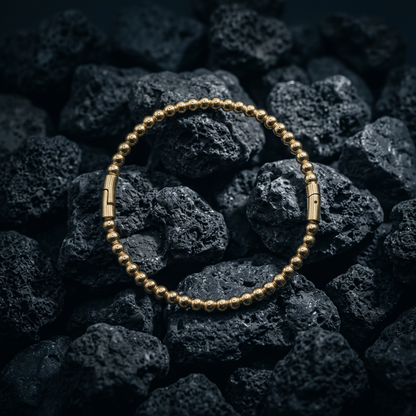 Gold, solid ball design, bangle with jump clasp. - Stellify Jewellery